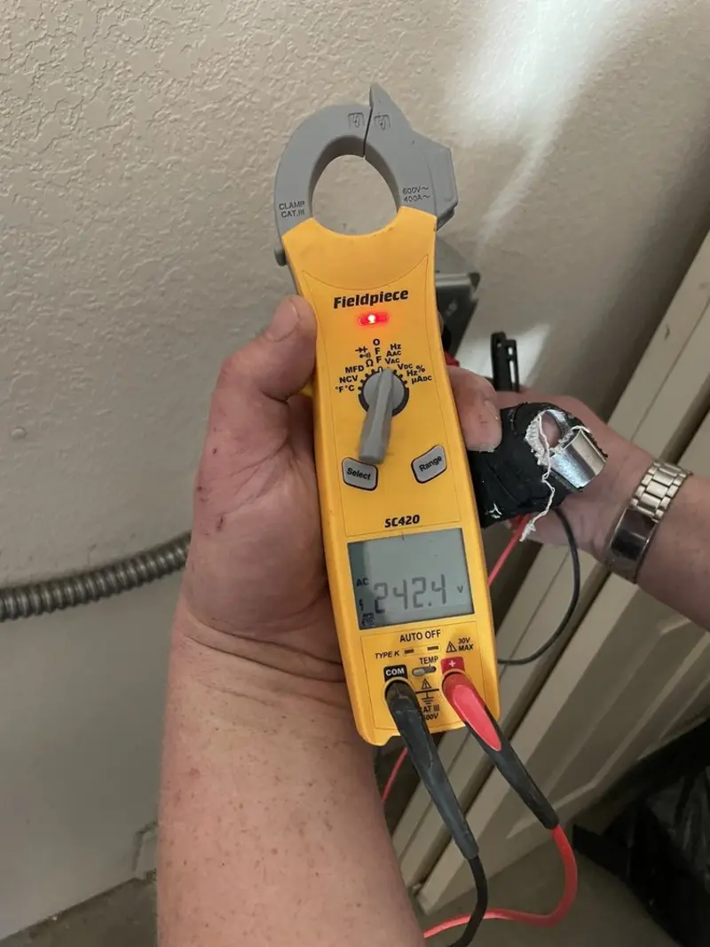 Voltage testing with clamp meter during Generator Installation in Moreno Valley
